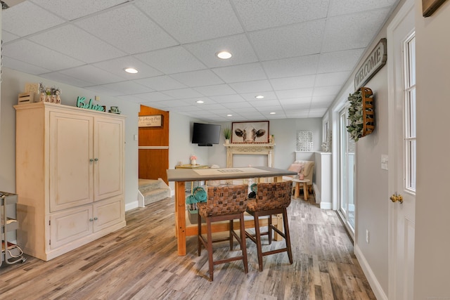 344 Oxbow Rd, Haddam, CT 06422 - dining area with light wood-style flooring, a drop ceiling, and recessed lighting