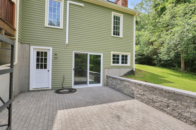 344 Oxbow Rd, Haddam, CT 06422 - back of property with a chimney, a patio area, and a yard