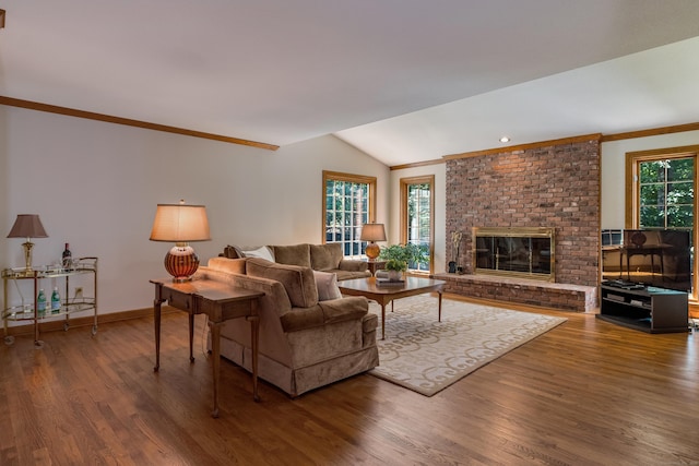 5 Billingsgate, Avon, CT 06001 - living area with crown molding, wood finished floors, vaulted ceiling, and a brick fireplace