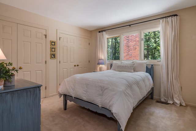 5 Billingsgate, Avon, CT 06001 - bedroom featuring light colored carpet and multiple closets