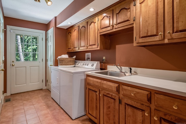5 Billingsgate, Avon, CT 06001 - laundry room with cabinet space, washer and dryer, light tile patterned floors, and recessed lighting