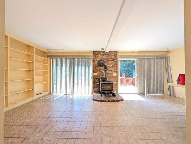 148A Westville Avenue Extension, Danbury, CT 06811 - unfurnished living room with built in shelves and a wood stove