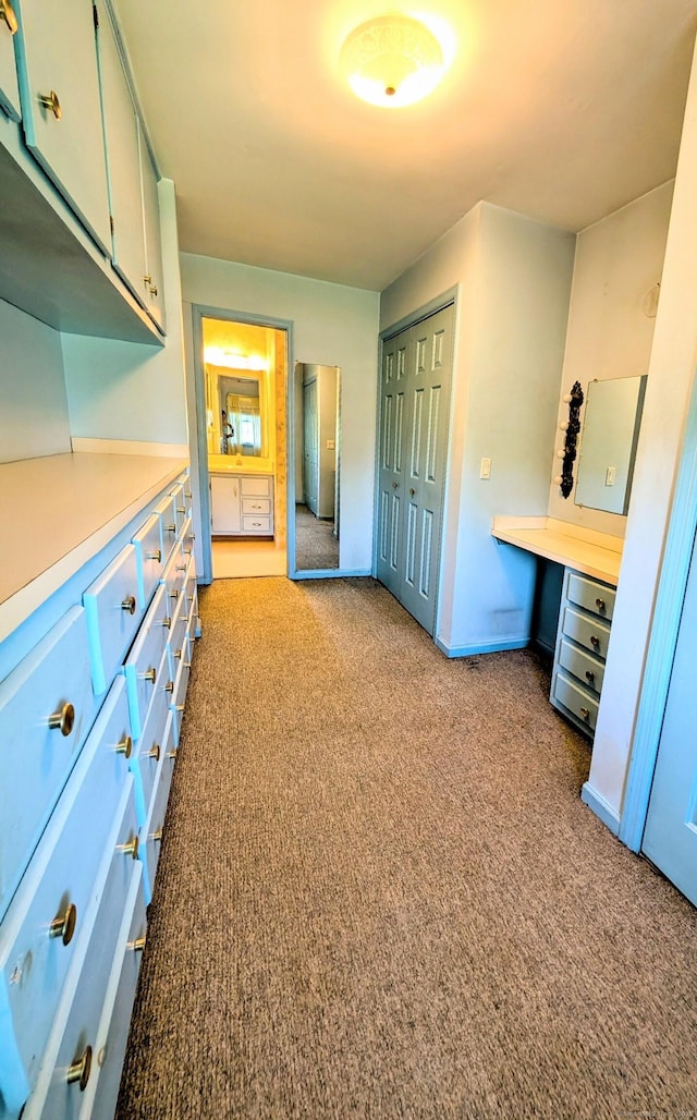 148A Westville Avenue Extension, Danbury, CT 06811 - unfurnished bedroom with carpet floors, a closet, and built in desk