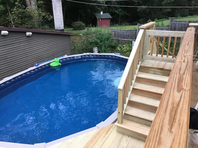 148A Westville Avenue Extension, Danbury, CT 06811 - view of swimming pool with stairway and a wooden deck