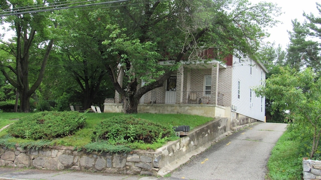 195 E Pearl St, Torrington, CT 06790 - obstructed view of property with brick siding