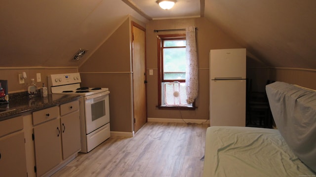 195 E Pearl St, Torrington, CT 06790 - kitchen featuring white appliances, light wood-style floors, vaulted ceiling, dark countertops, and white cabinetry