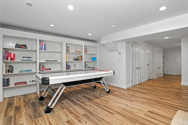 566 Hoyt St, Darien, CT 06820 - recreation room with recessed lighting and light wood-style floors