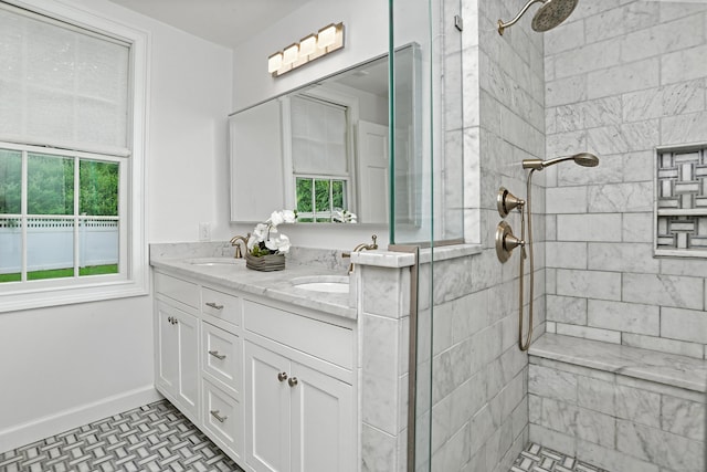 566 Hoyt St, Darien, CT 06820 - bathroom featuring a shower stall and double vanity