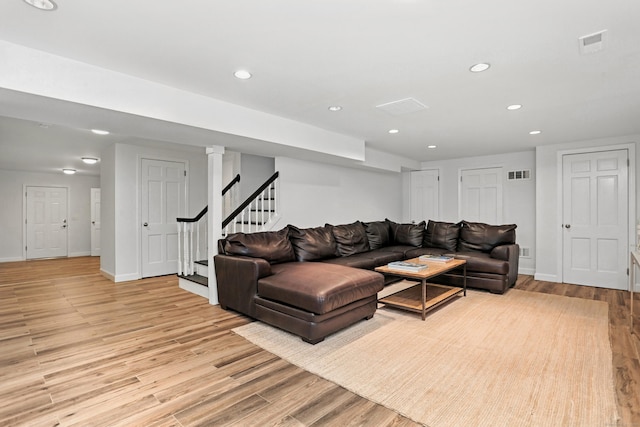 566 Hoyt St, Darien, CT 06820 - living area featuring recessed lighting, light wood finished floors, and stairway