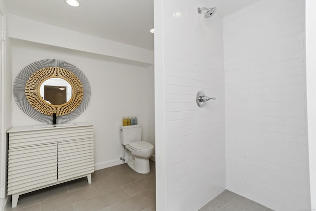 566 Hoyt St, Darien, CT 06820 - full bath with a tile shower, vanity, and tile patterned floors