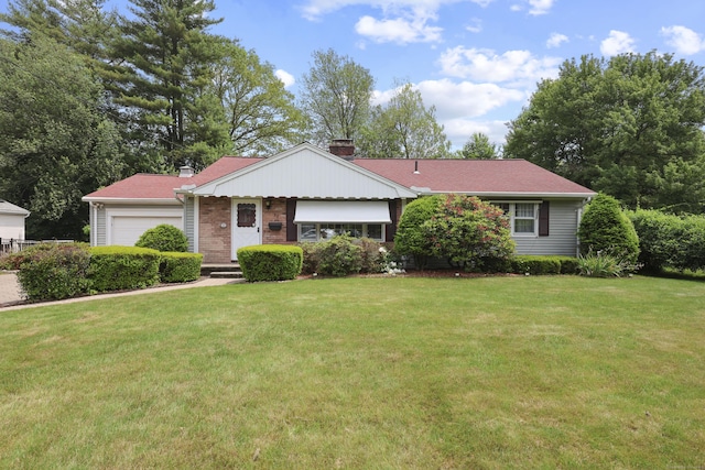 32 Butternut Ridge Rd, Waterbury, CT 06706 - single story home featuring a chimney, a front yard, and a garage
