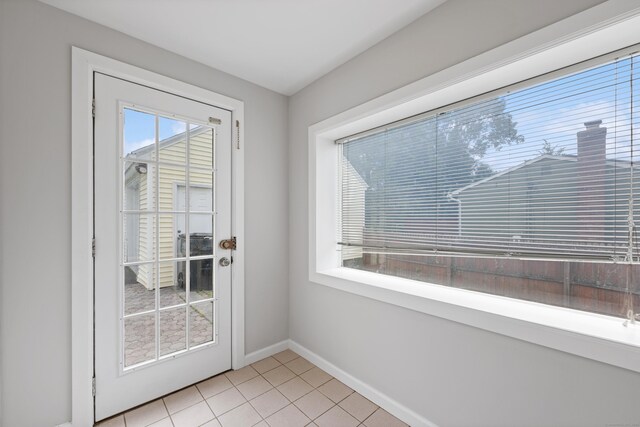 630 French St, Watertown, CT 06779 - doorway to outside featuring baseboards and light tile patterned floors