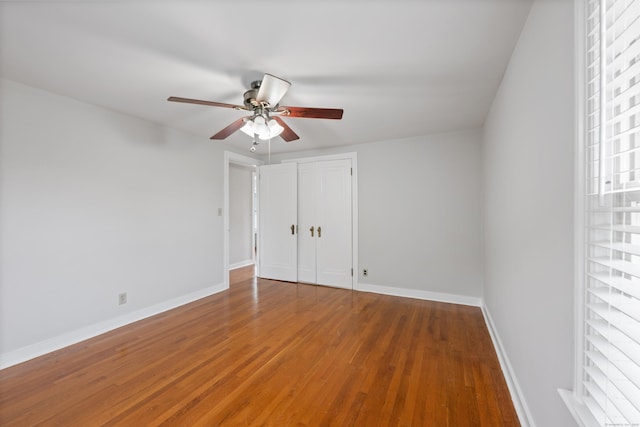 630 French St, Watertown, CT 06779 - unfurnished bedroom with wood finished floors, a closet, and a ceiling fan