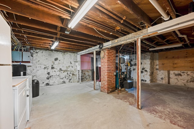 630 French St, Watertown, CT 06779 - unfinished basement with washer / dryer, a heating unit, and electric panel