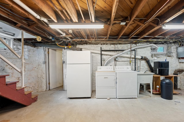 630 French St, Watertown, CT 06779 - below grade area featuring freestanding refrigerator, washer and clothes dryer, and stairs