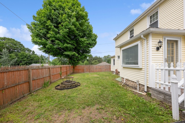 630 French St, Watertown, CT 06779 - fenced backyard featuring an outdoor fire pit