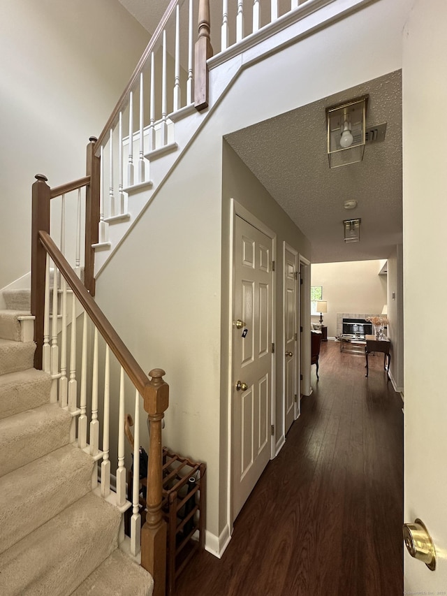 202 The Mews Unit 202, Rocky Hill, CT 06067 - staircase with wood finished floors and baseboards