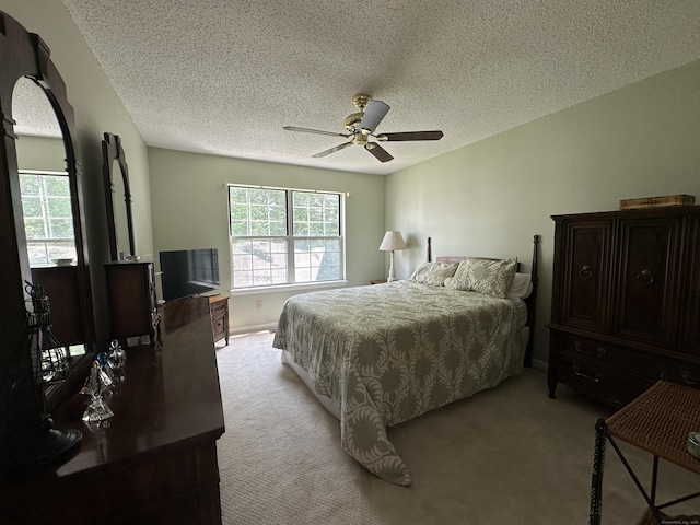 202 The Mews Unit 202, Rocky Hill, CT 06067 - bedroom with light carpet, a textured ceiling, and a ceiling fan