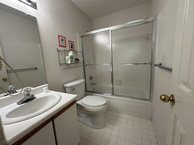 202 The Mews Unit 202, Rocky Hill, CT 06067 - full bath featuring tile patterned flooring, vanity, combined bath / shower with glass door, and a textured ceiling