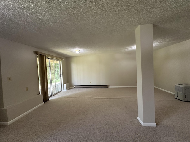 202 The Mews Unit 202, Rocky Hill, CT 06067 - below grade area with a baseboard radiator, carpet flooring, and a textured ceiling