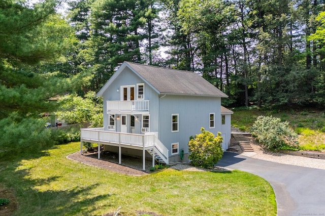 5 Hemlock Notch St, Farmington, CT 06085 - rear view of property with stairway, a balcony, a lawn, and roof with shingles