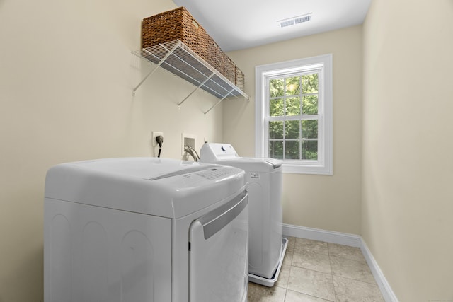 257 Ichabod Rd, Southbury, CT 06488 - washroom with separate washer and dryer and baseboards