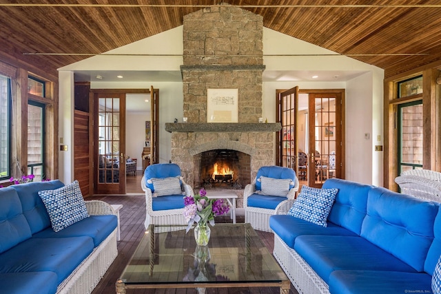 77 E Wharf Rd, Madison, CT 06443 - living area featuring wooden ceiling, a fireplace, wood finished floors, and high vaulted ceiling