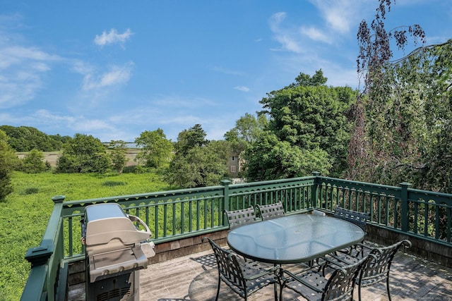 77 E Wharf Rd, Madison, CT 06443 - wooden deck featuring outdoor dining space and a grill