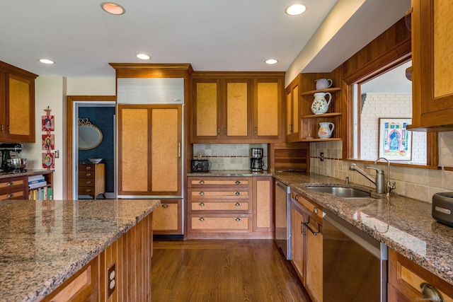 77 E Wharf Rd, Madison, CT 06443 - kitchen with paneled built in fridge, brown cabinets, decorative backsplash, recessed lighting, and stone counters