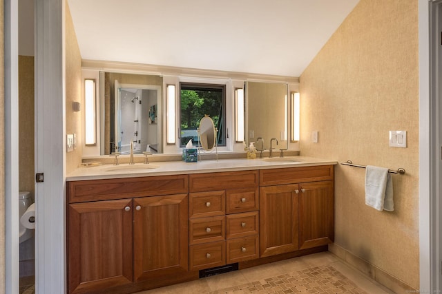 77 E Wharf Rd, Madison, CT 06443 - bathroom featuring double vanity, tile patterned floors, and lofted ceiling