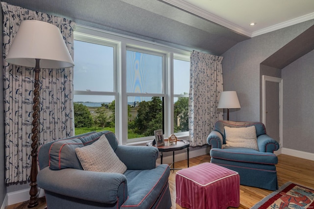 77 E Wharf Rd, Madison, CT 06443 - living room with ornamental molding, lofted ceiling, and wood finished floors