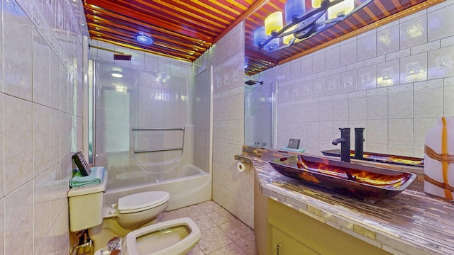 167 George St, Hartford, CT 06114 - bathroom with tile walls, tile patterned floors, vanity, a bidet, and bathing tub / shower combination
