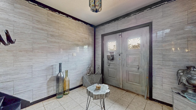 167 George St, Hartford, CT 06114 - foyer with tile walls and light tile patterned floors