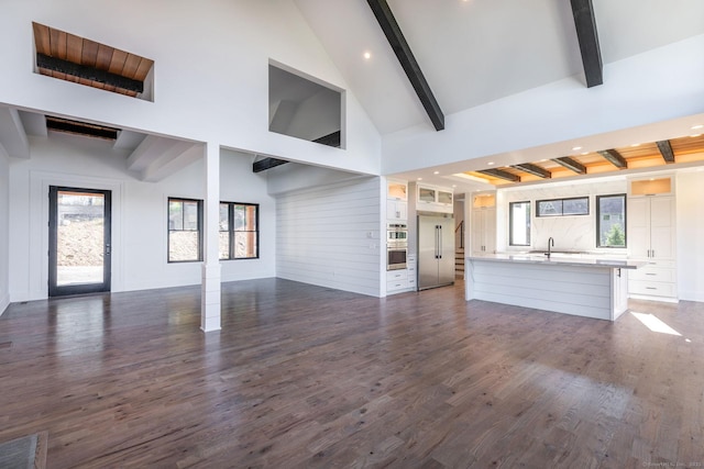 103 Chalybes Rd W, Roxbury, CT 06783 - unfurnished living room with dark wood finished floors and recessed lighting