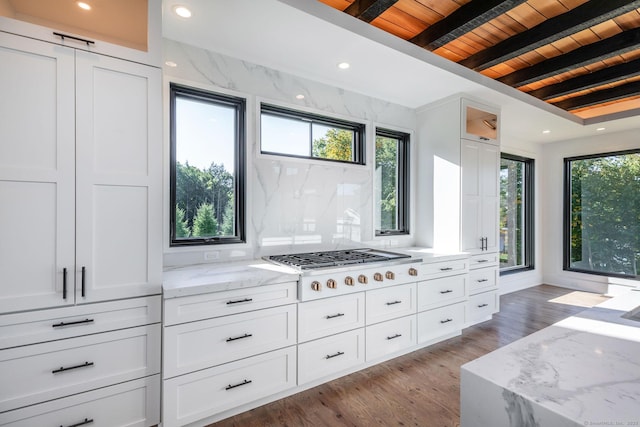 103 Chalybes Rd W, Roxbury, CT 06783 - kitchen with a wooden ceiling with exposed beams, white cabinets, light wood-type flooring, light stone counters, and white gas stovetop