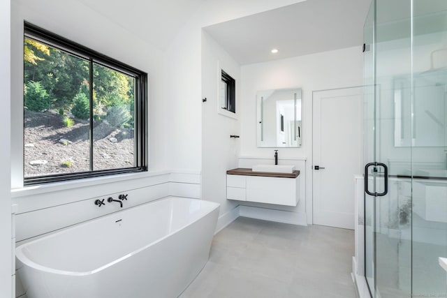 103 Chalybes Rd W, Roxbury, CT 06783 - bathroom with vanity, a stall shower, a soaking tub, and recessed lighting