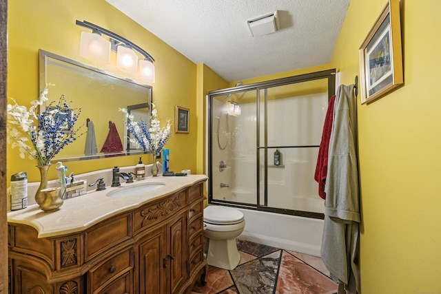 52 Irving St Apt 4, Bristol, CT 06010 - full bathroom featuring vanity, a textured ceiling, and shower / bath combination with glass door