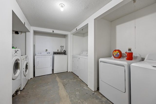 52 Irving St Apt 4, Bristol, CT 06010 - laundry area featuring washing machine and clothes dryer and a textured ceiling