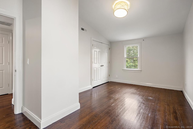 19 Sherwood Dr, Westport, CT 06880 - unfurnished bedroom with hardwood / wood-style floors, lofted ceiling, and a closet
