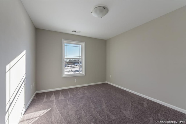 2 Lombard Cir Unit 2, North Haven, CT 06473 - spare room featuring carpet flooring and baseboards
