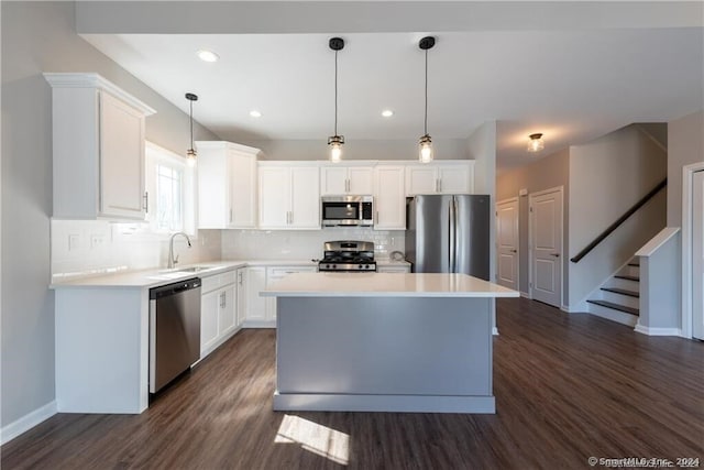 4 Lombard Cir Unit 4, North Haven, CT 06473 - kitchen with stainless steel appliances, dark wood-style flooring, tasteful backsplash, and recessed lighting