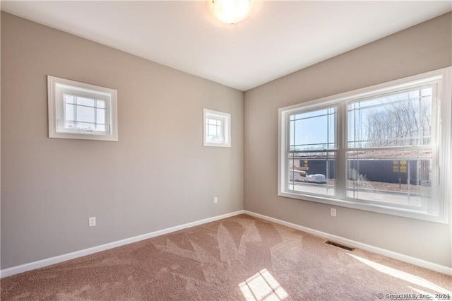 4 Lombard Cir Unit 4, North Haven, CT 06473 - carpeted empty room featuring baseboards