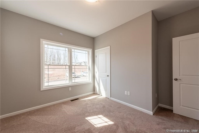 4 Lombard Cir Unit 4, North Haven, CT 06473 - unfurnished bedroom featuring carpet floors