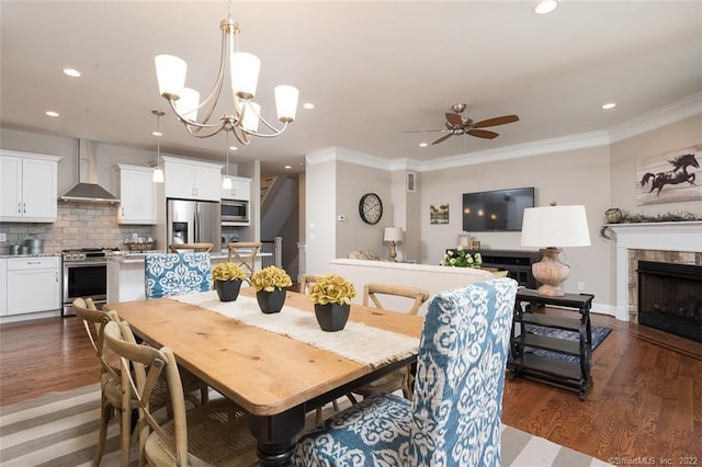 120 Yorkshire Ct Unit 120, Farmington, CT 06032 - dining space featuring recessed lighting, ceiling fan, dark wood-style flooring, a fireplace, and ornamental molding