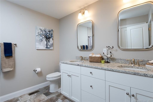 120 Yorkshire Ct Unit 120, Farmington, CT 06032 - bathroom featuring baseboards and double vanity