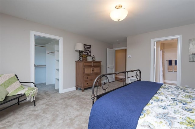 120 Yorkshire Ct Unit 120, Farmington, CT 06032 - bedroom with a walk in closet, light colored carpet, a closet, and connected bathroom