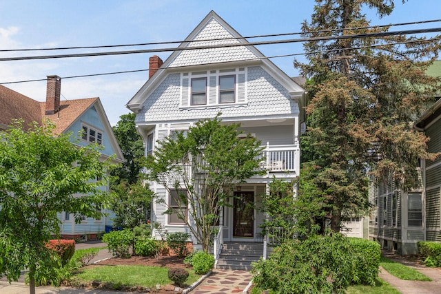 48 Livingston St, New Haven, CT 06511 - victorian-style house featuring a balcony