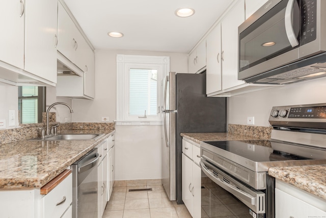 48 Livingston St, New Haven, CT 06511 - kitchen with appliances with stainless steel finishes, healthy amount of natural light, white cabinetry, and recessed lighting