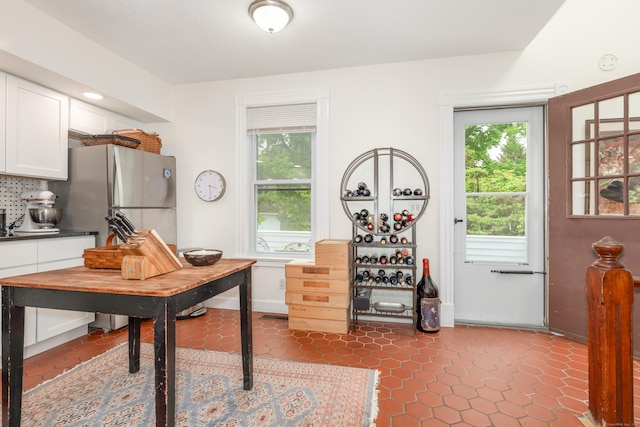 48 Livingston St, New Haven, CT 06511 - office area featuring healthy amount of natural light and dark tile patterned flooring