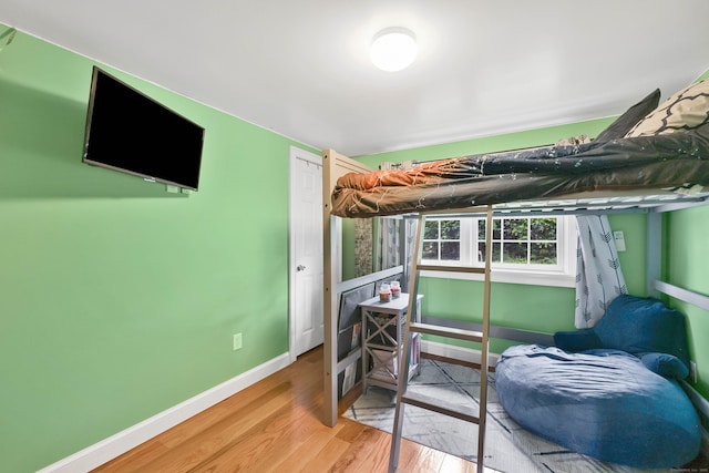 1117 N Grand St, Suffield, CT 06093 - bedroom featuring baseboards and wood finished floors